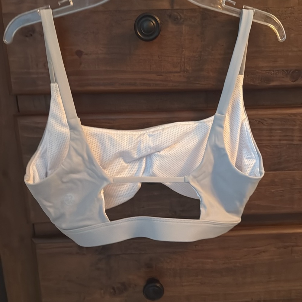 Sports bra. Never worn. Size: medium.Color: Bluish grey. - Picture 3 of 4